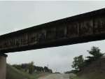Old Green Bay Western Railroad Bridge leads east to switch spur for Frontier-Servco FS